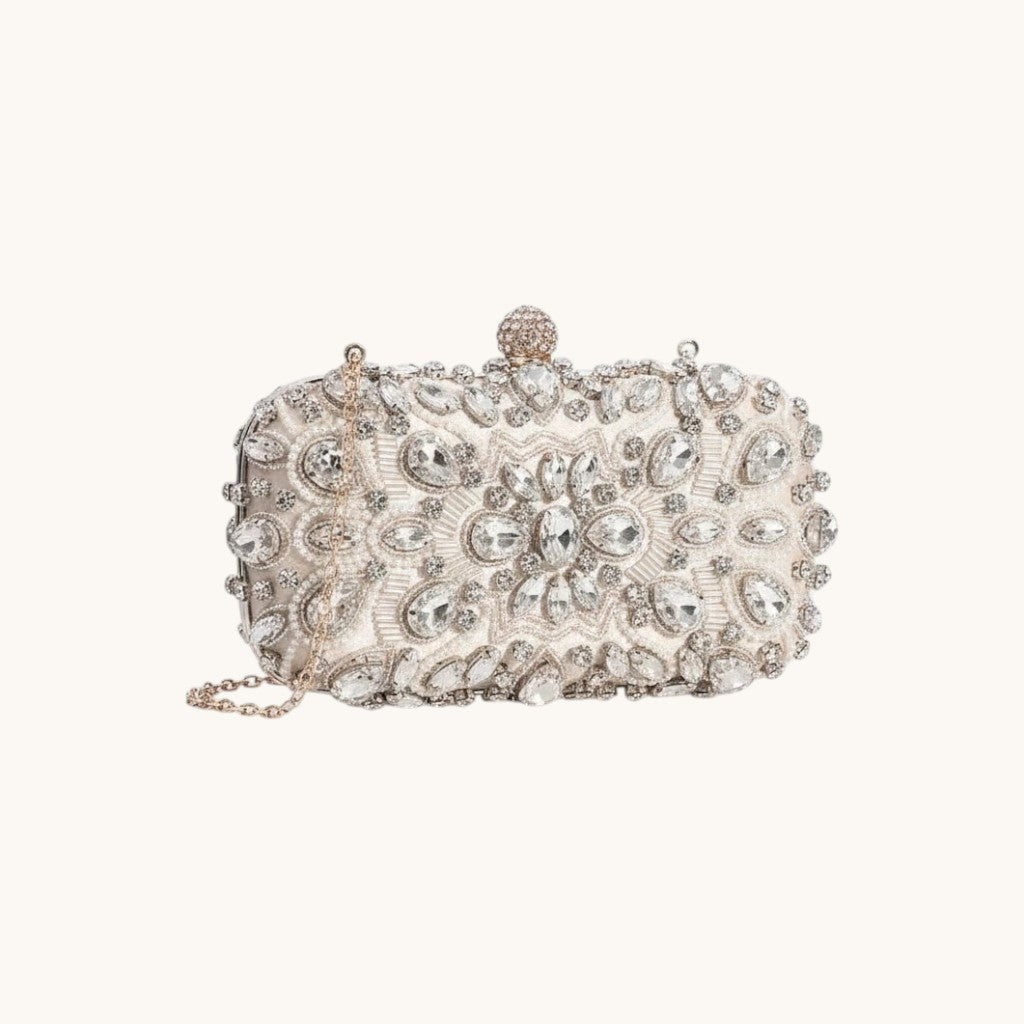 Adan & La clutch bag with gold silk bottom cloth, embellished with clear rhinestones and pearls. Hard box structure, 110cm chain.