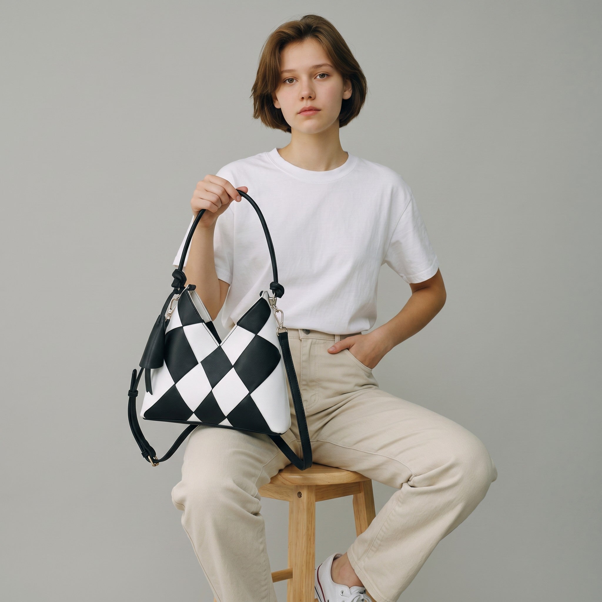 Adan & La Niche Woven Patchwork Bag, black and white PU leather, horizontal square shape, everyday styling.